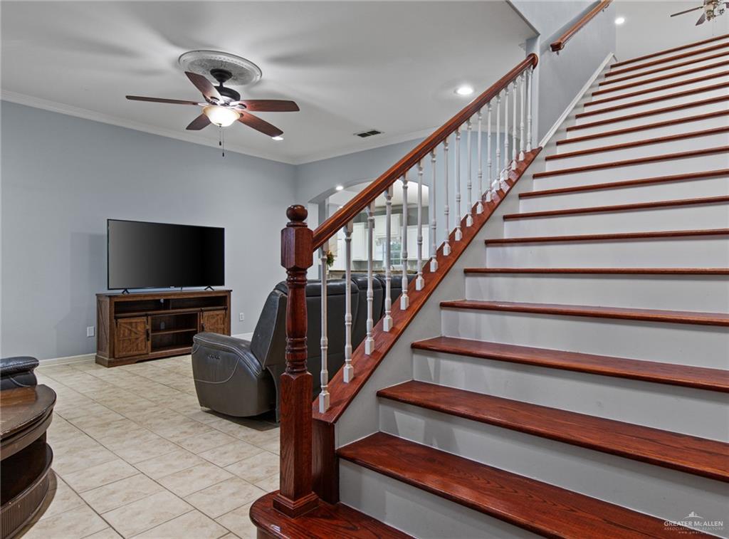 15474 Primera Road Harlingen, TX 78552 - Photo 25 of 45 a living room with furniture and a flat screen tv