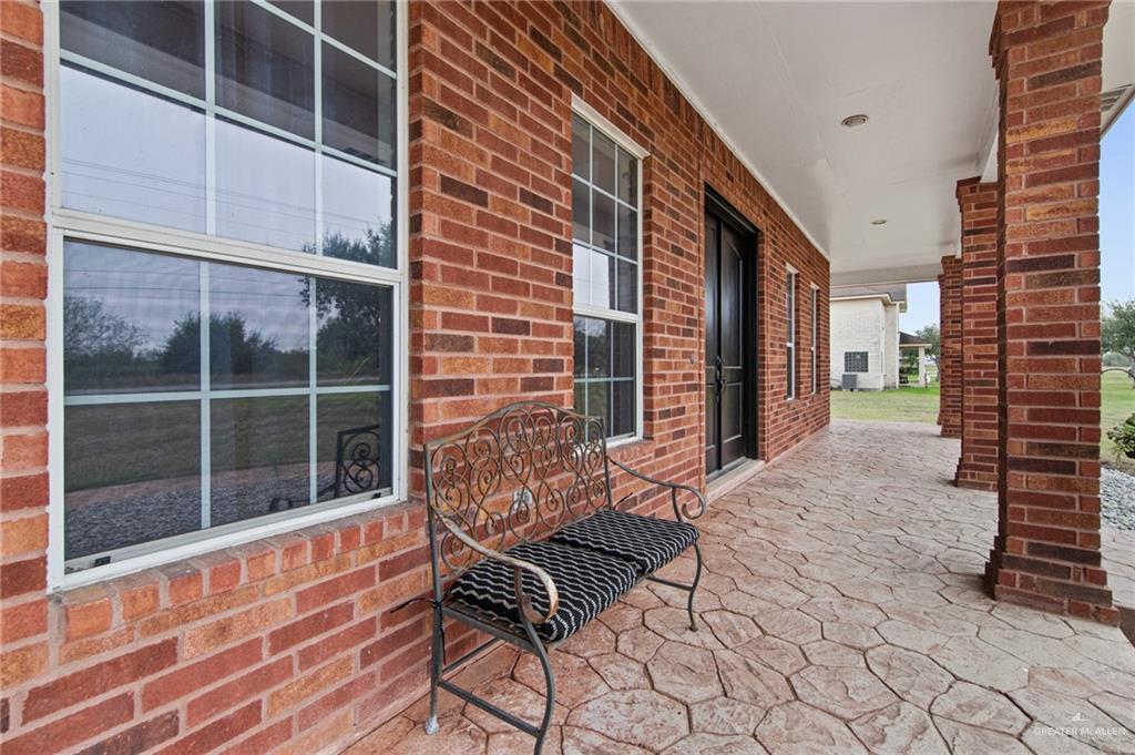 15474 Primera Road Harlingen, TX 78552 - Photo 37 of 45 a view of a house with backyard and sitting area