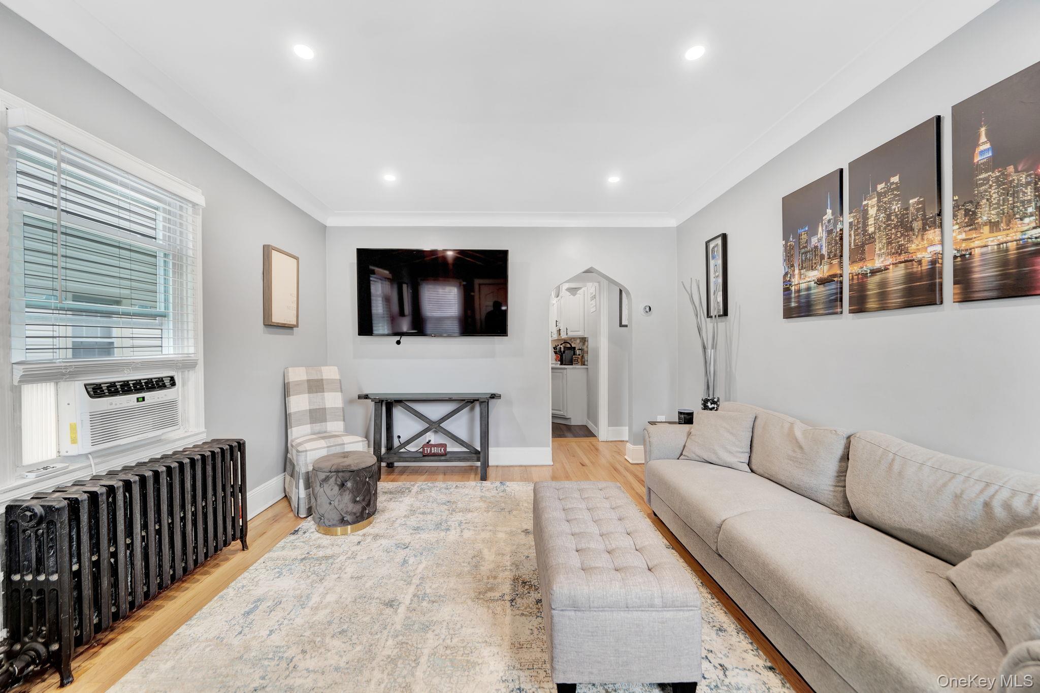 19 Westmoreland Road Merrick, NY 11566 - Photo 2 of 25 Living room with recessed lighting and hard wood floors