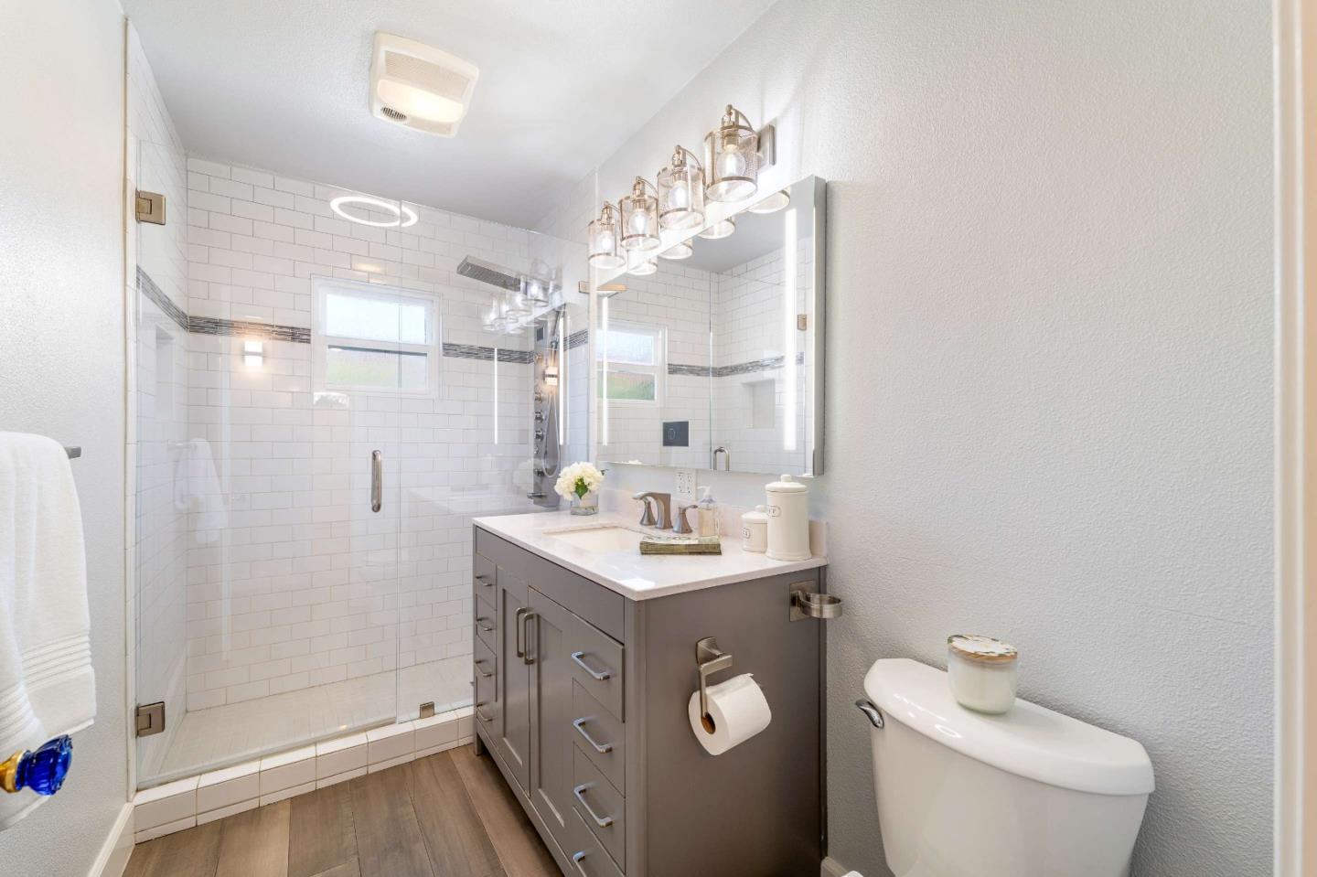 1 Serrano Way Del Rey Oaks, CA 93940 - Photo 25 of 47 a bathroom with a sink a toilet and shower