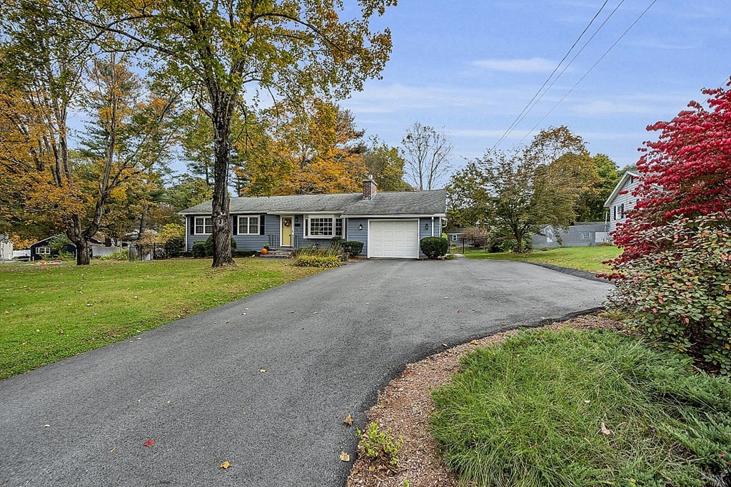 4 Radcliffe Road North Chelmsford, MA 01863 - Photo 1 of 40 a view of house with yard and green space