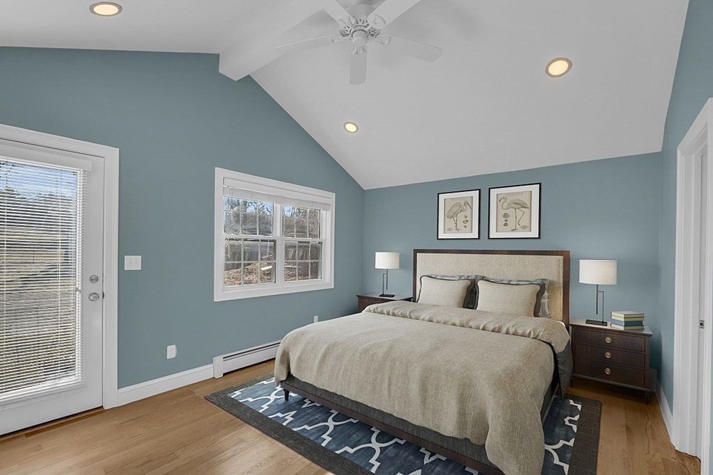 4 Radcliffe Road North Chelmsford, MA 01863 - Photo 14 of 40 a bedroom with a large bed and a window