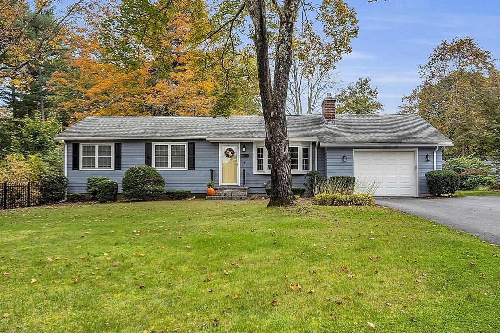 4 Radcliffe Road North Chelmsford, MA 01863 - Photo 2 of 40 a front view of house with yard and green space