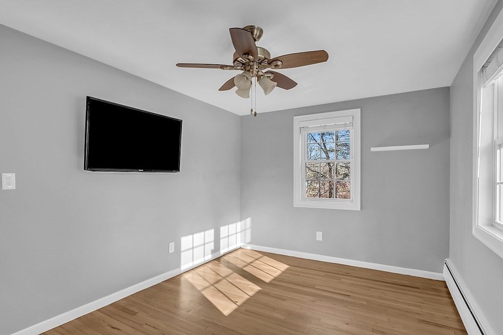 4 Radcliffe Road North Chelmsford, MA 01863 - Photo 26 of 40 a view of a livingroom with a flat screen tv