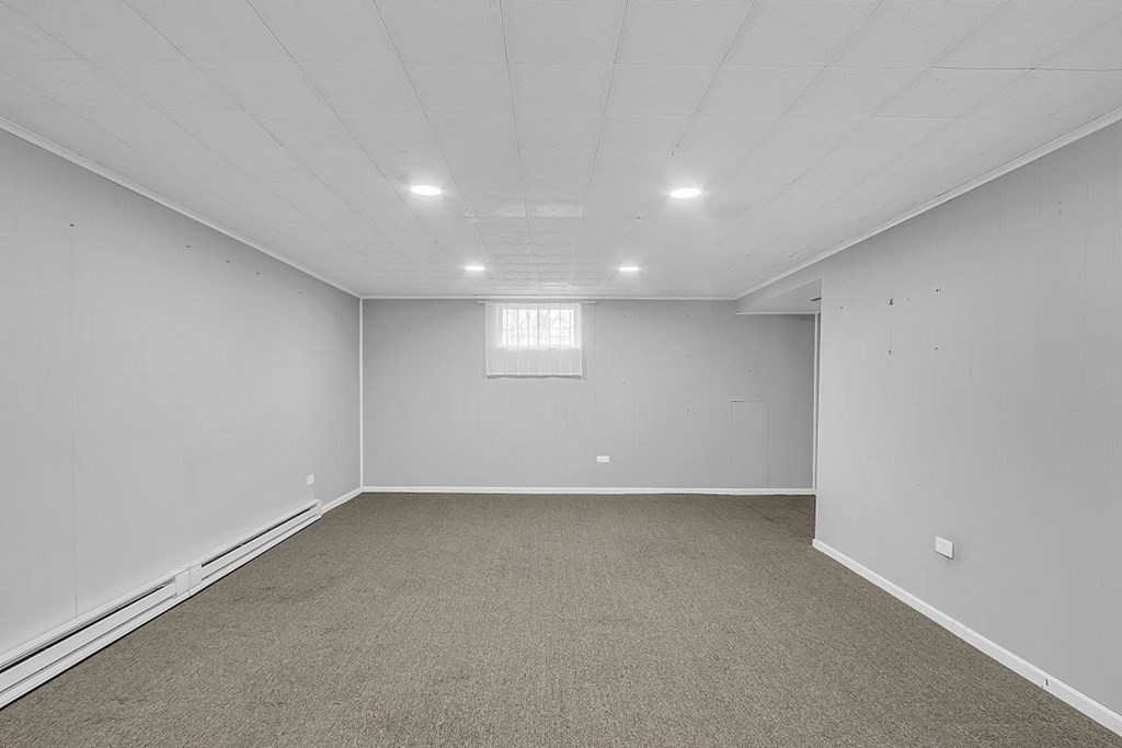 4 Radcliffe Road North Chelmsford, MA 01863 - Photo 30 of 40 a view of an empty room with a window
