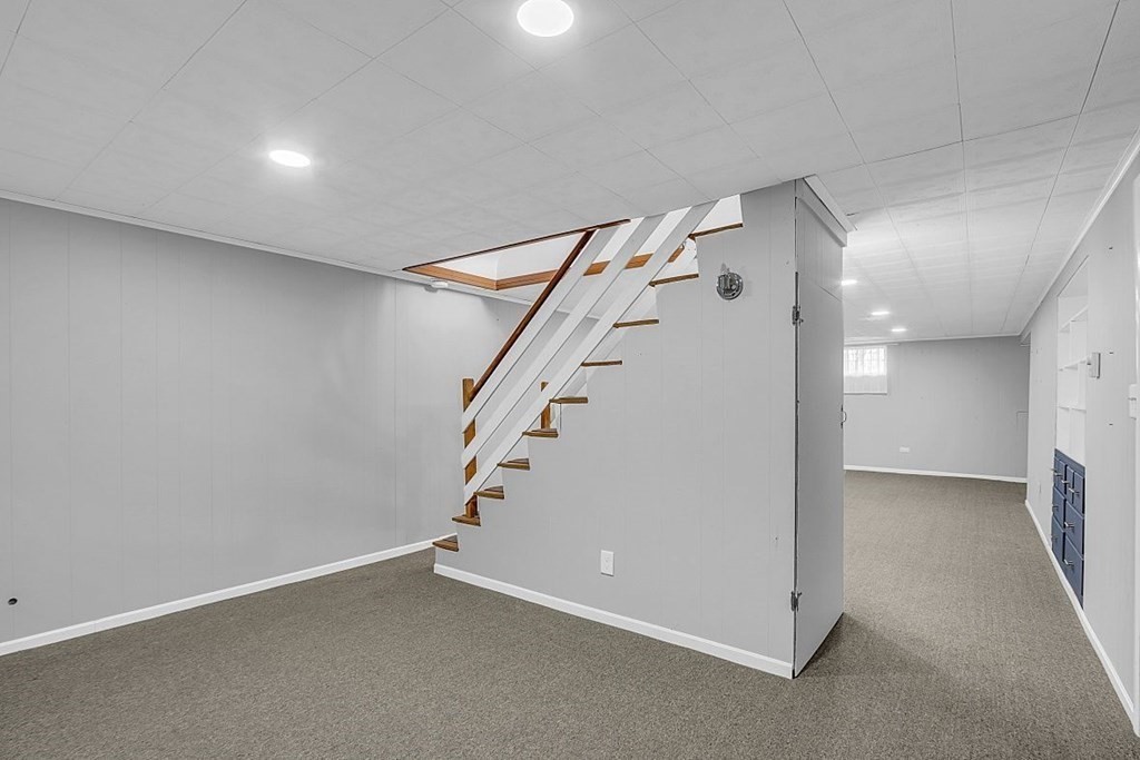 4 Radcliffe Road North Chelmsford, MA 01863 - Photo 32 of 40 a view of an empty room with a fireplace