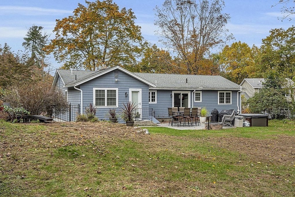 4 Radcliffe Road North Chelmsford, MA 01863 - Photo 35 of 40 a front view of house with yard patio and green space