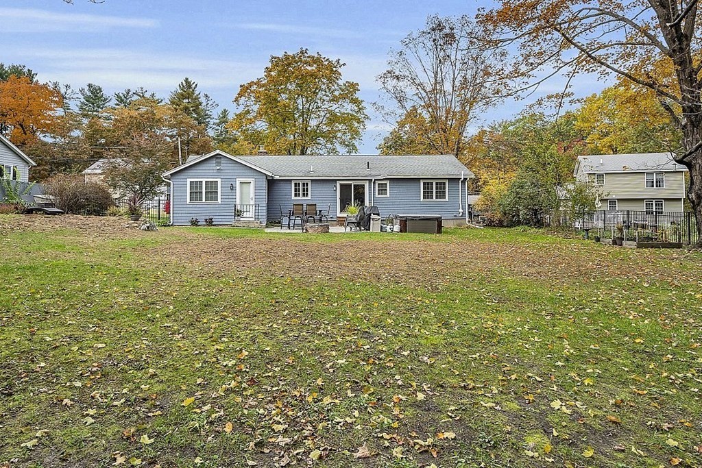 4 Radcliffe Road North Chelmsford, MA 01863 - Photo 38 of 40 a large house with a big yard and large trees