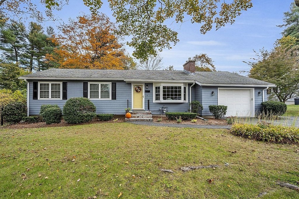 4 Radcliffe Road North Chelmsford, MA 01863 - Photo 5 of 40 a view of a house with a backyard and a tree