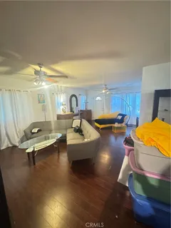 a living room with furniture pool table and view living room