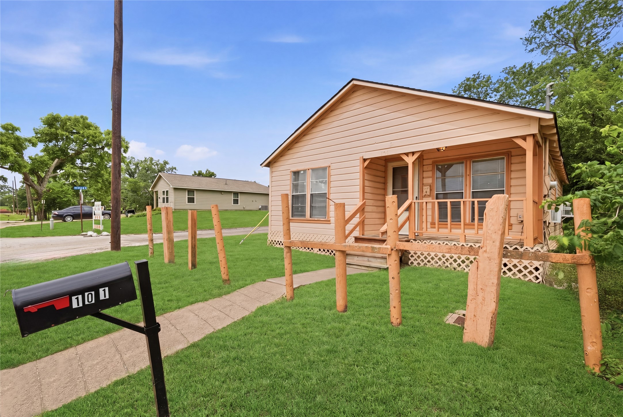 101 Outlar Street Wharton, TX 77488 - Photo 2 of 40 a view of a house with a yard