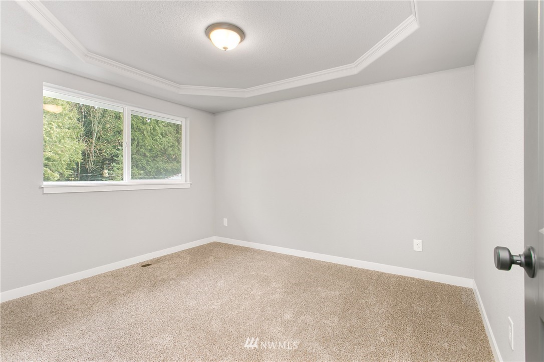 23028 35th Avenue Southeast Bothell, WA 98021 - Photo 16 of 25 an empty room with a window