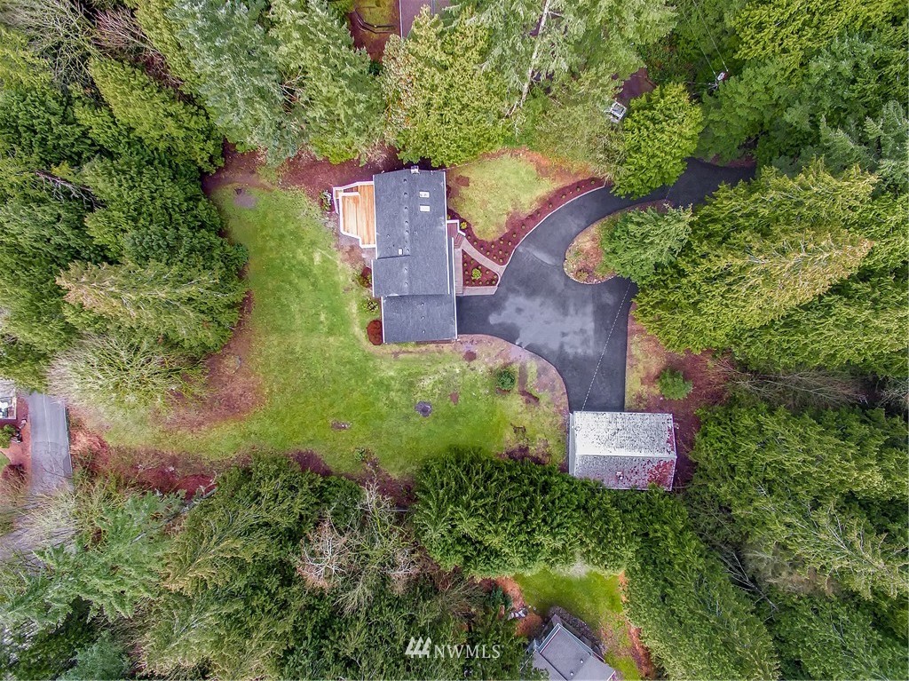 23028 35th Avenue Southeast Bothell, WA 98021 - Photo 3 of 25 an aerial view of a house with a yard