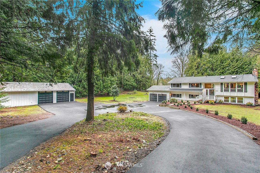 23028 35th Avenue Southeast Bothell, WA 98021 - Photo 25 of 25 swimming pool view with a seating space and a garden