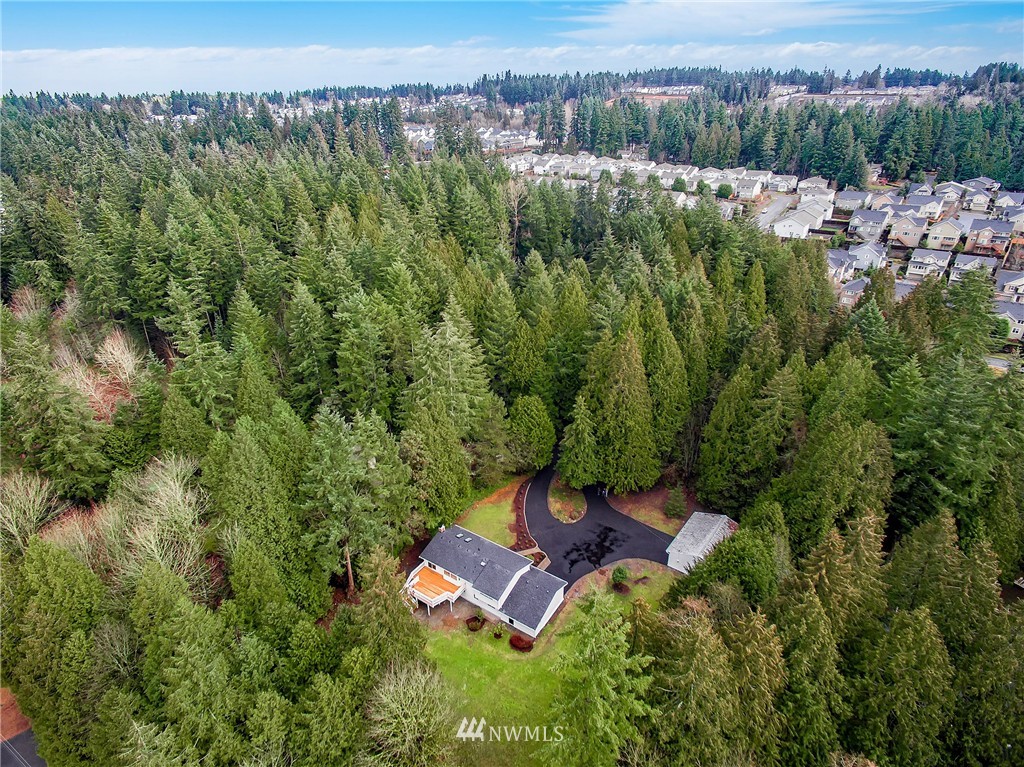 23028 35th Avenue Southeast Bothell, WA 98021 - Photo 5 of 25 an aerial view of a house with a yard