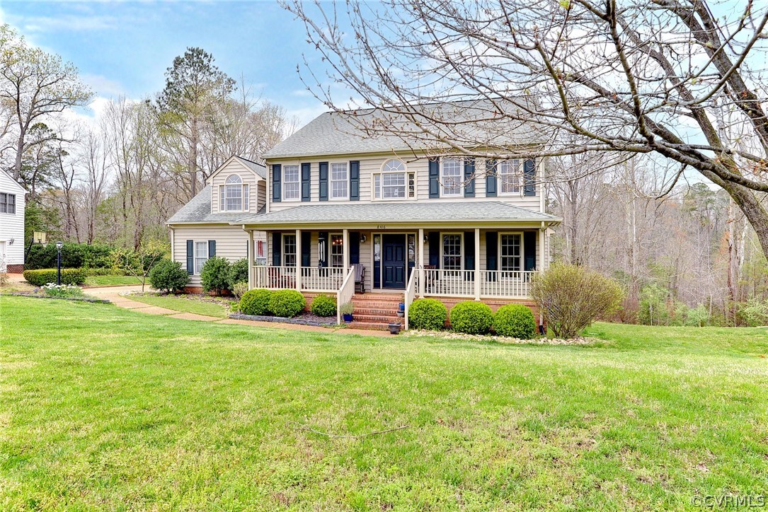 8416 Down Patrick Way Williamsburg, VA 23188 - Photo 2 of 47 a view of house in front of a big yard with large trees