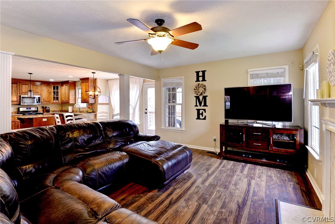 8416 Down Patrick Way Williamsburg, VA 23188 - Photo 21 of 47 a living room with furniture and a flat screen tv