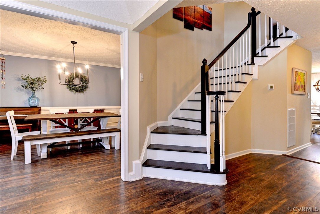 8416 Down Patrick Way Williamsburg, VA 23188 - Photo 22 of 47 a view of entryway and hall with wooden floor