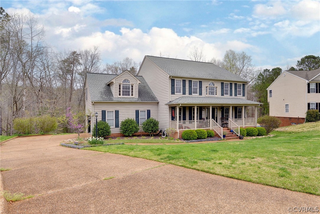 8416 Down Patrick Way Williamsburg, VA 23188 - Photo 3 of 47 a front view of a house with a yard