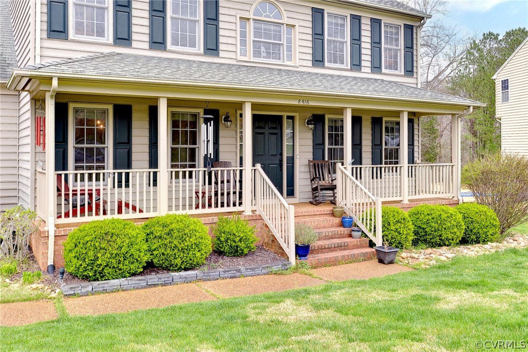 8416 Down Patrick Way Williamsburg, VA 23188 - Photo 4 of 47 front view of a house next to a yard