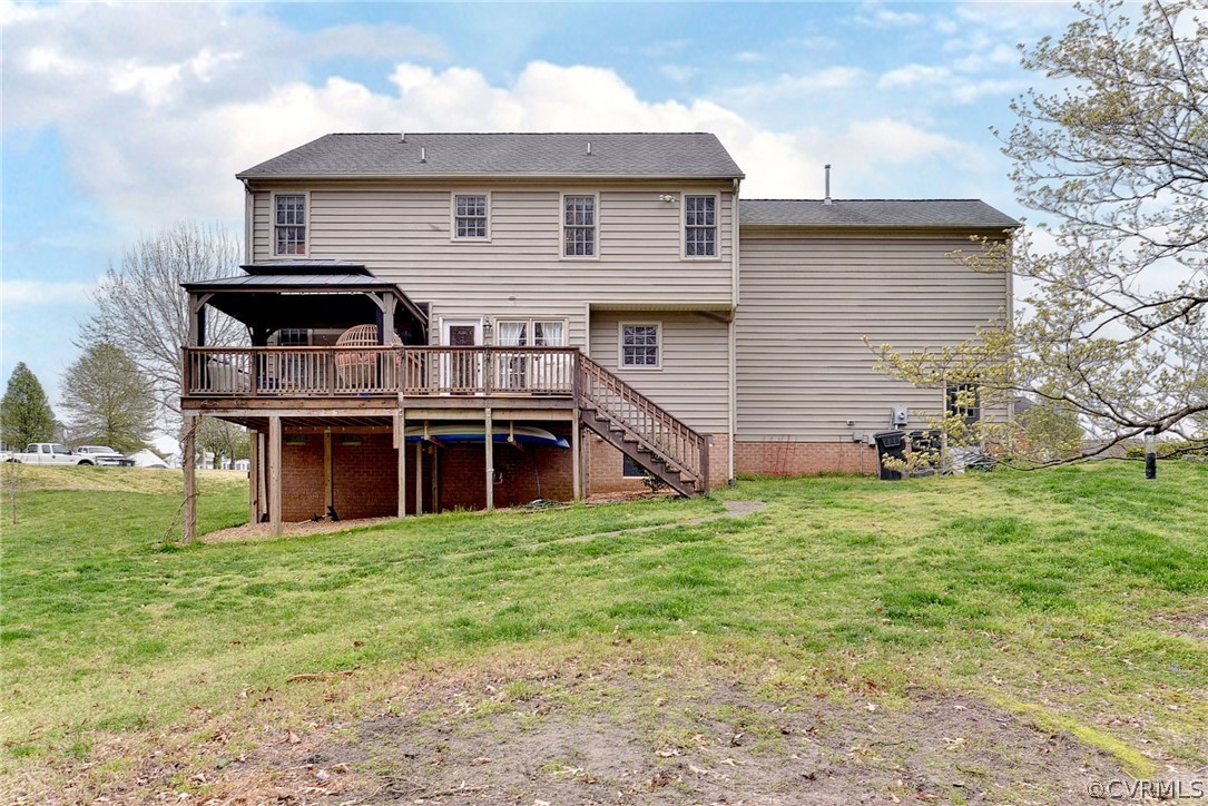 8416 Down Patrick Way Williamsburg, VA 23188 - Photo 41 of 47 a view of a house with a yard