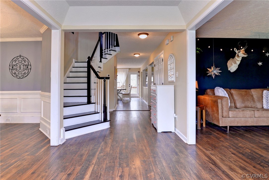 8416 Down Patrick Way Williamsburg, VA 23188 - Photo 6 of 47 a view of entryway and hall with wooden floor