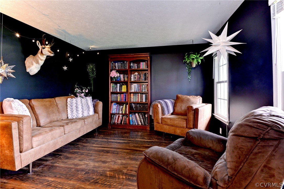 8416 Down Patrick Way Williamsburg, VA 23188 - Photo 7 of 47 a living room with furniture and wooden floor