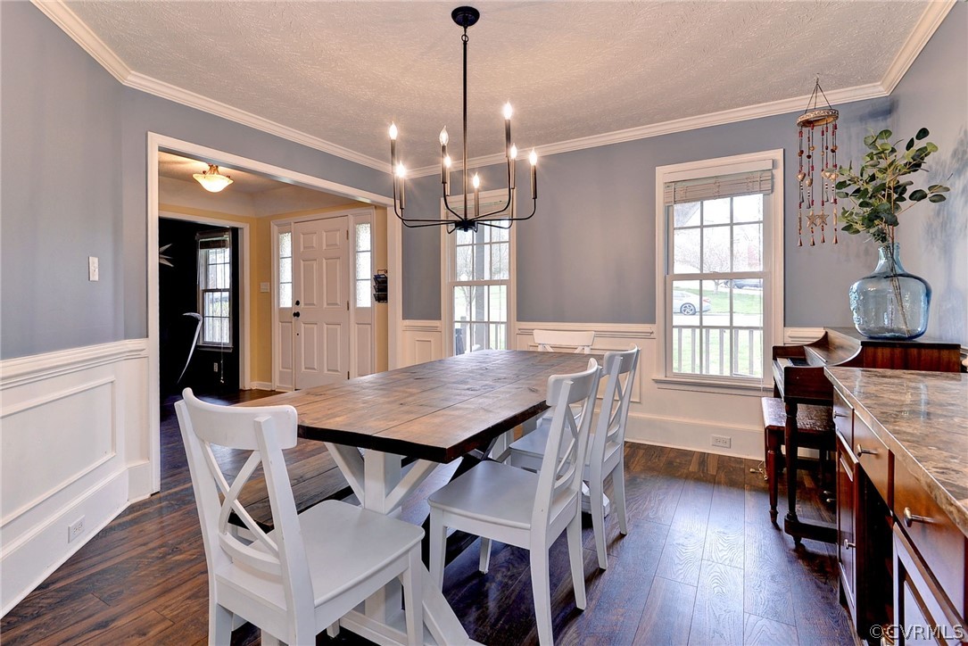 8416 Down Patrick Way Williamsburg, VA 23188 - Photo 9 of 47 a view of a dining room with furniture window and wooden floor