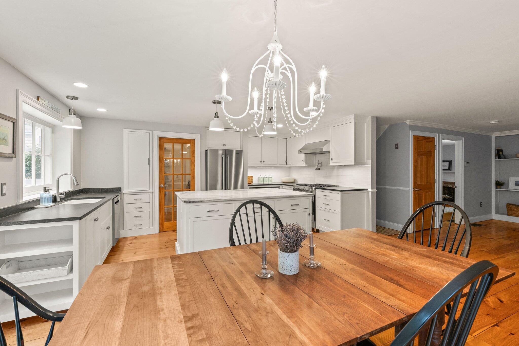 1756 Osterville West Barnstable Road West Barnstable, MA 02668 - Photo 17 of 62 a view of a dining room with furniture and chandelier