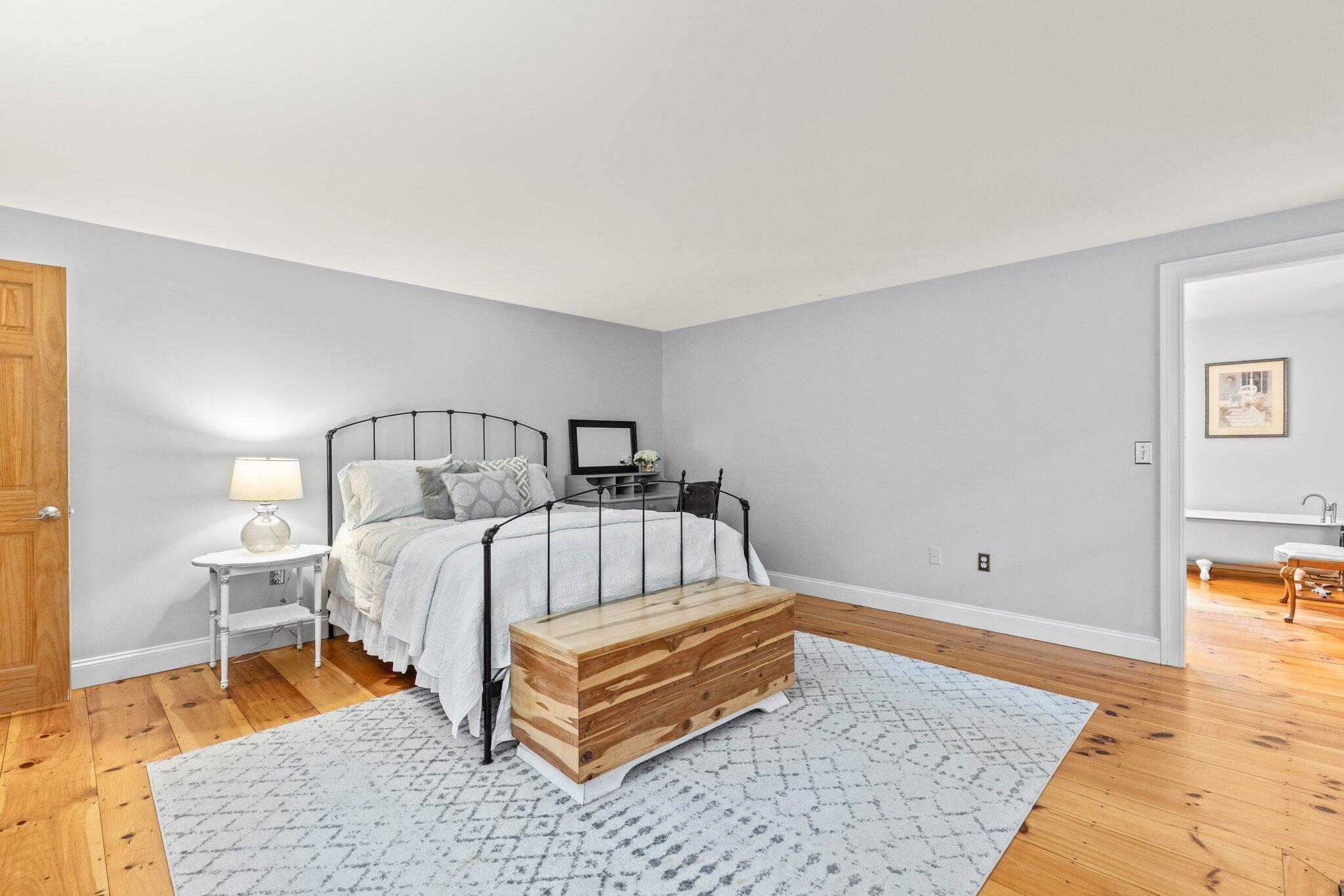 1756 Osterville West Barnstable Road West Barnstable, MA 02668 - Photo 27 of 62 a bedroom with a bed and wooden floor