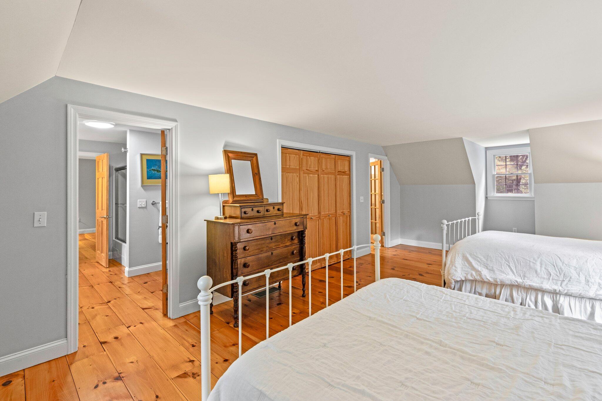 1756 Osterville West Barnstable Road West Barnstable, MA 02668 - Photo 33 of 62 a bedroom with a bed and wooden floor
