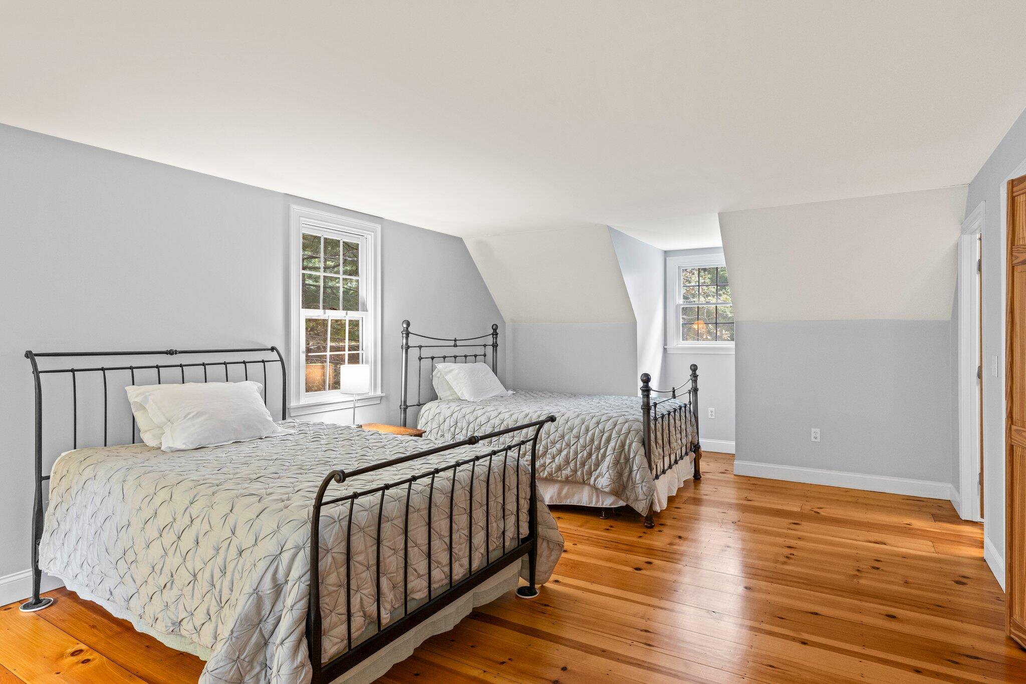 1756 Osterville West Barnstable Road West Barnstable, MA 02668 - Photo 35 of 62 a bedroom with a bed and wooden floor