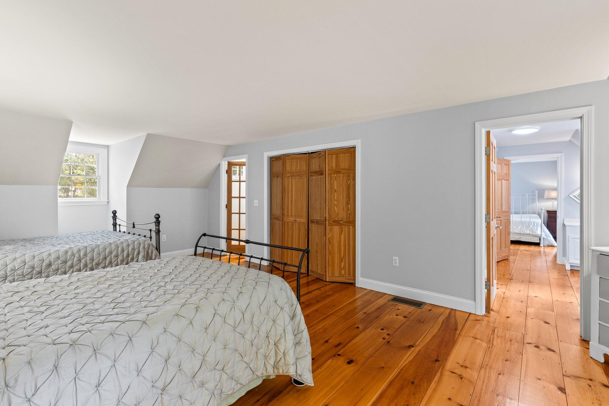 1756 Osterville West Barnstable Road West Barnstable, MA 02668 - Photo 36 of 62 a bedroom with a bed and wooden floor