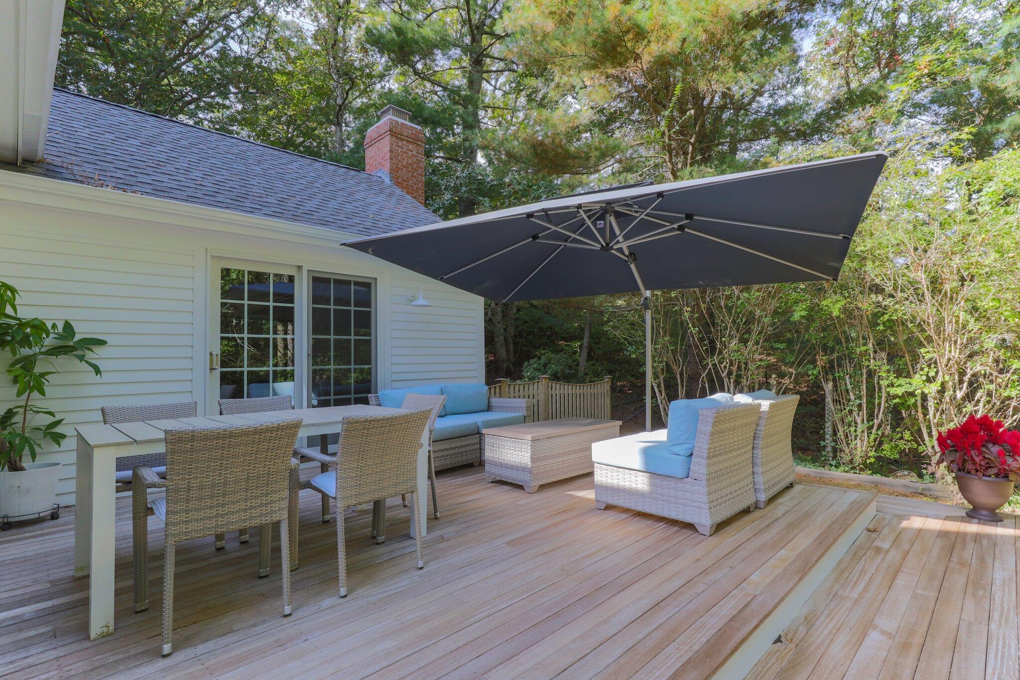 1756 Osterville West Barnstable Road West Barnstable, MA 02668 - Photo 48 of 62 a view of a chairs and table in the patio