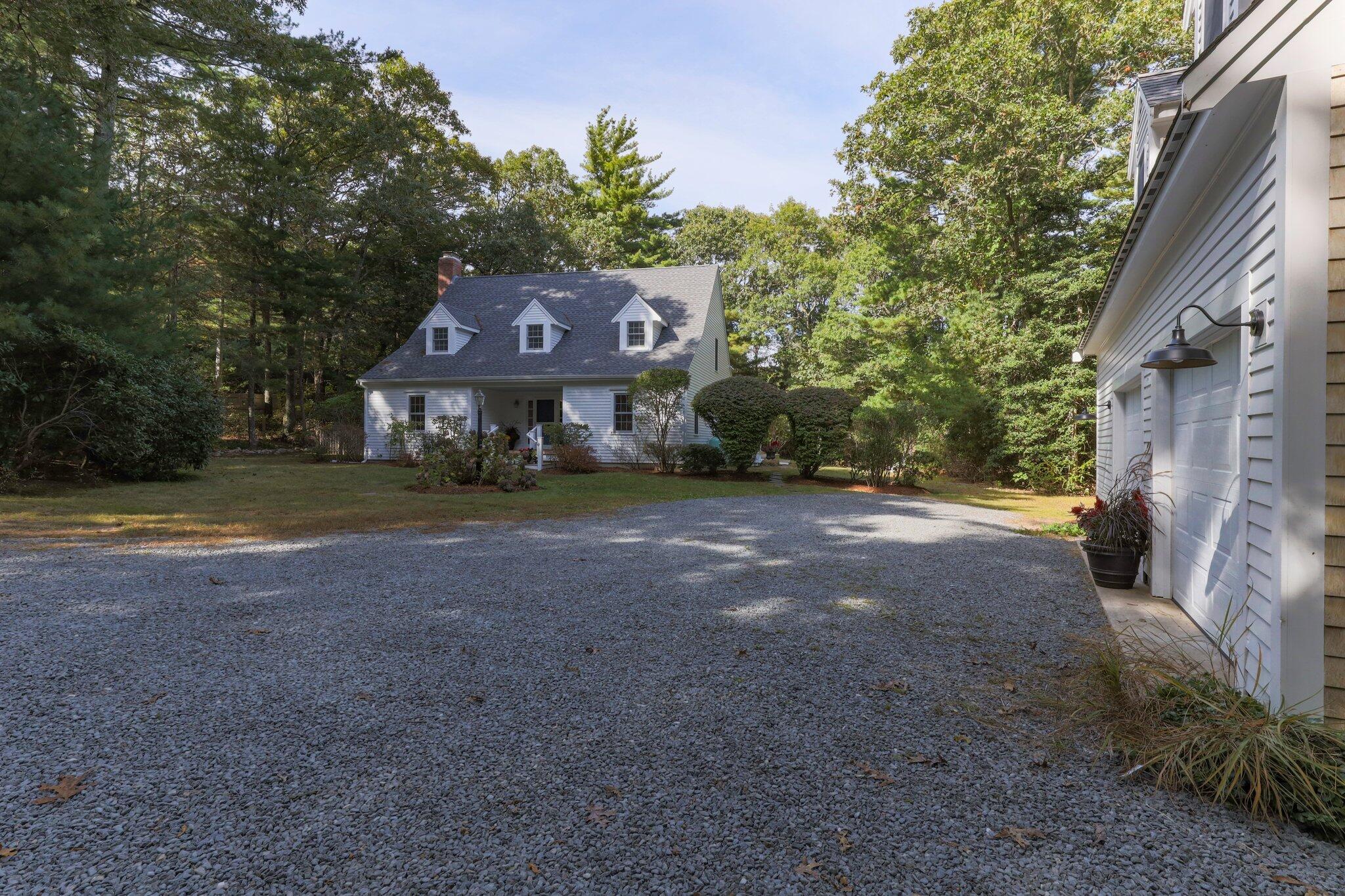 1756 Osterville West Barnstable Road West Barnstable, MA 02668 - Photo 56 of 62 a front view of a house with a yard