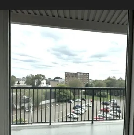 a balcony with a lake view