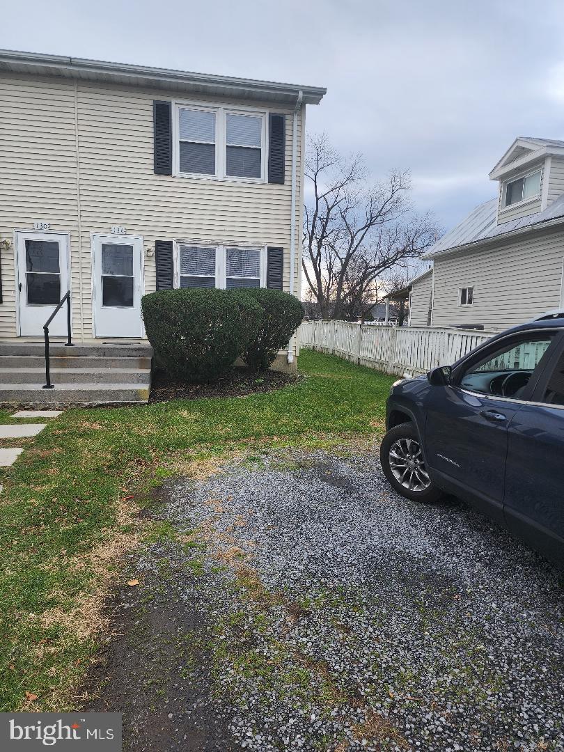 130-134 West 13th Street, Unit 134 Front Royal, VA 22630 - Photo 1 of 21 a view of a house with a back yard