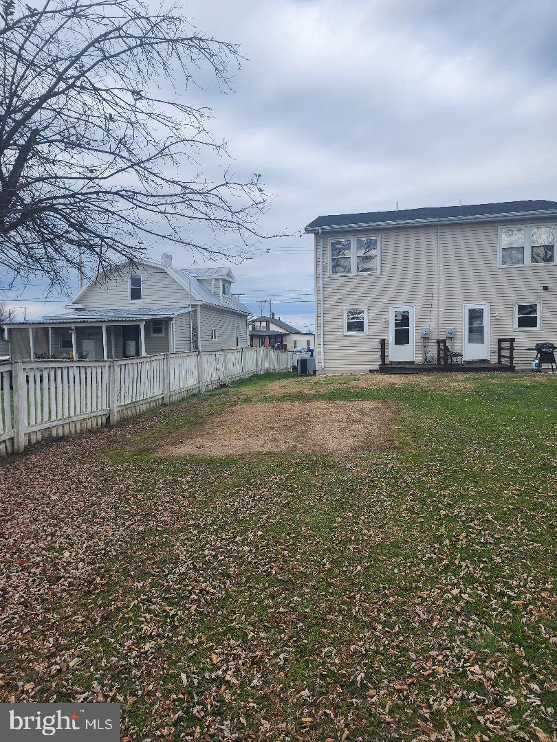 130-134 West 13th Street, Unit 134 Front Royal, VA 22630 - Photo 21 of 21 a view of a house with a yard