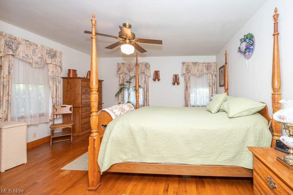 24093 Georgetown Road Homeworth, OH 44634 - Photo 12 of 35 Large master suite which has hardwood floors, lot of windows and full bath.