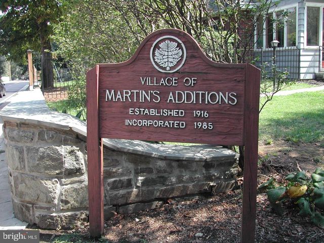 a view of a sign board with a park