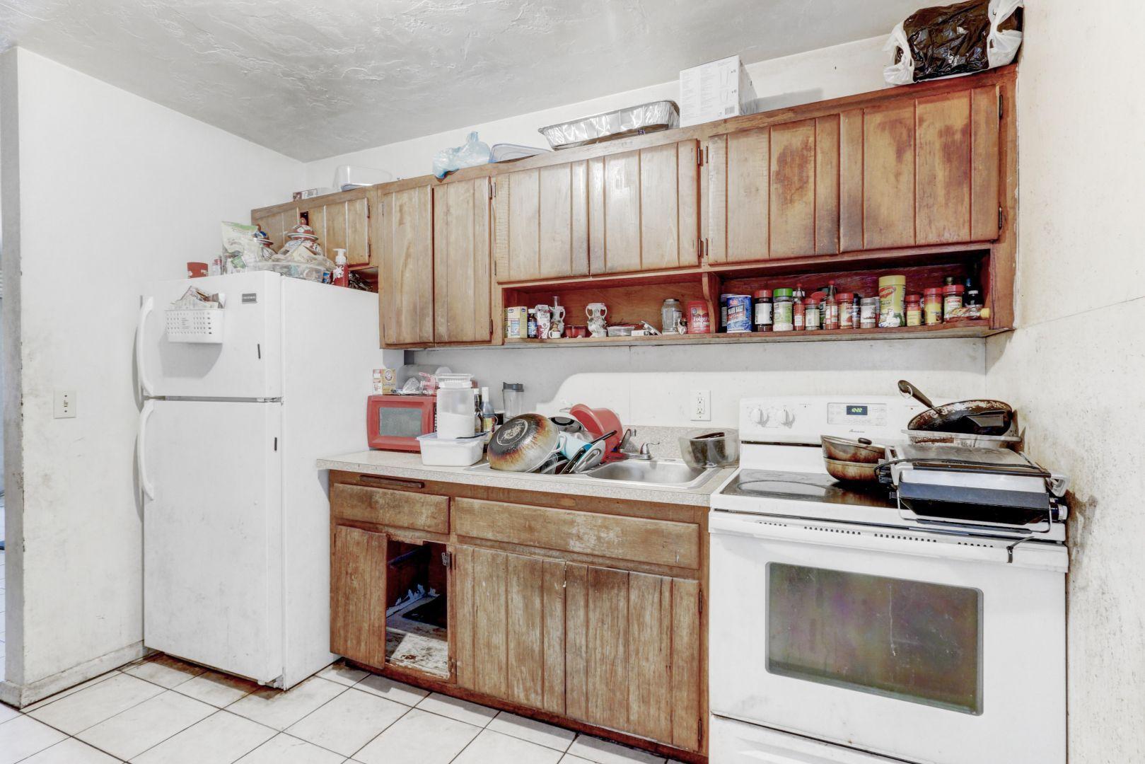 360 West Blue Heron Boulevard, Unit 1 Riviera Beach, FL 33404 - Photo 23 of 43 Kitchen