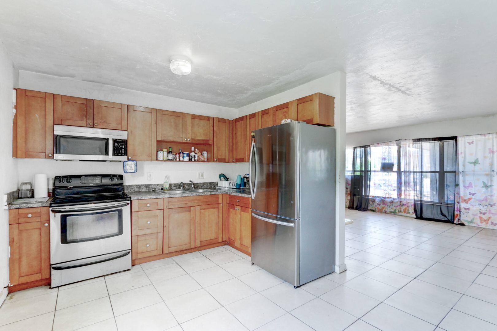 360 West Blue Heron Boulevard, Unit 1 Riviera Beach, FL 33404 - Photo 8 of 43 Kitchen