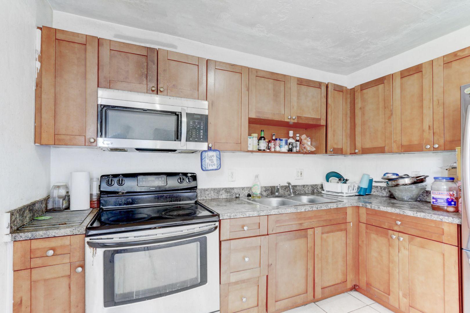 360 West Blue Heron Boulevard, Unit 1 Riviera Beach, FL 33404 - Photo 10 of 43 Kitchen