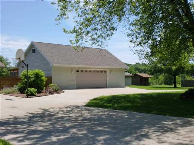 14877 Zahm Road Rockton, IL 61072 - Photo 3 of 15 a front view of house with yard and green space