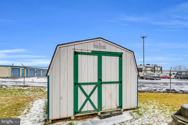 a view of a swimming pool with a chair