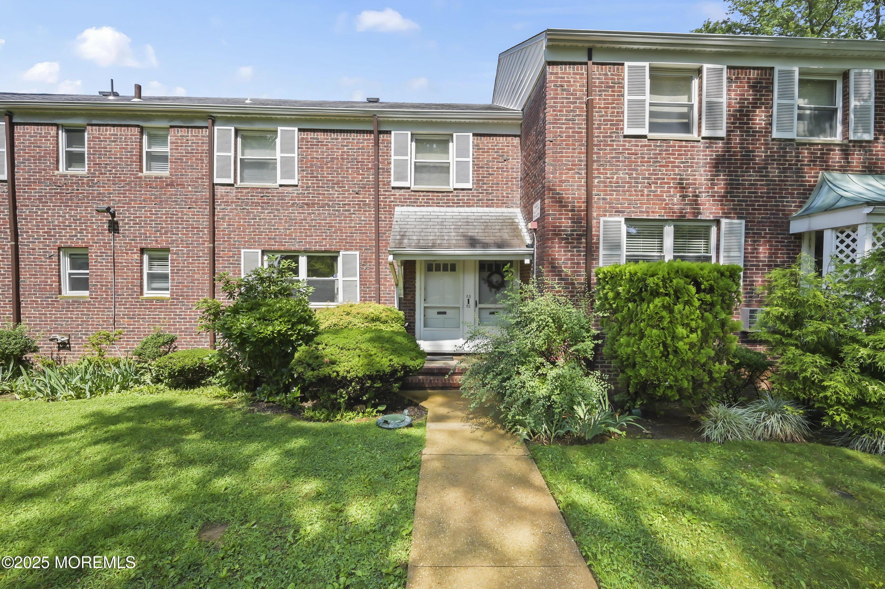 front view of house with a yard
