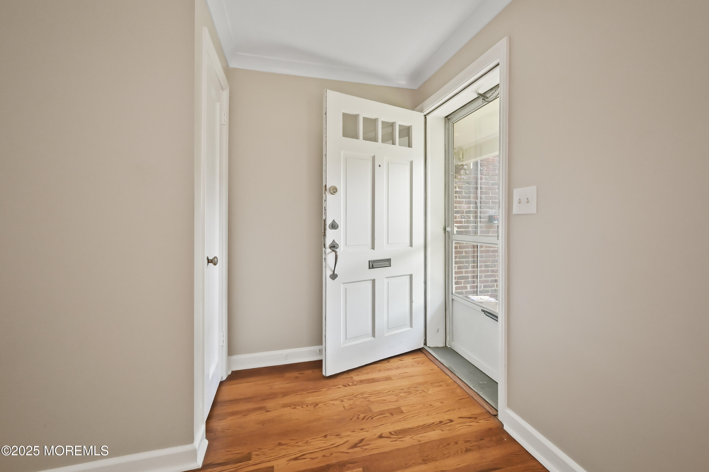 82 Manor Drive, Unit 803 Red Bank, NJ 07701 - Photo 2 of 19 a view of hallway with natural light