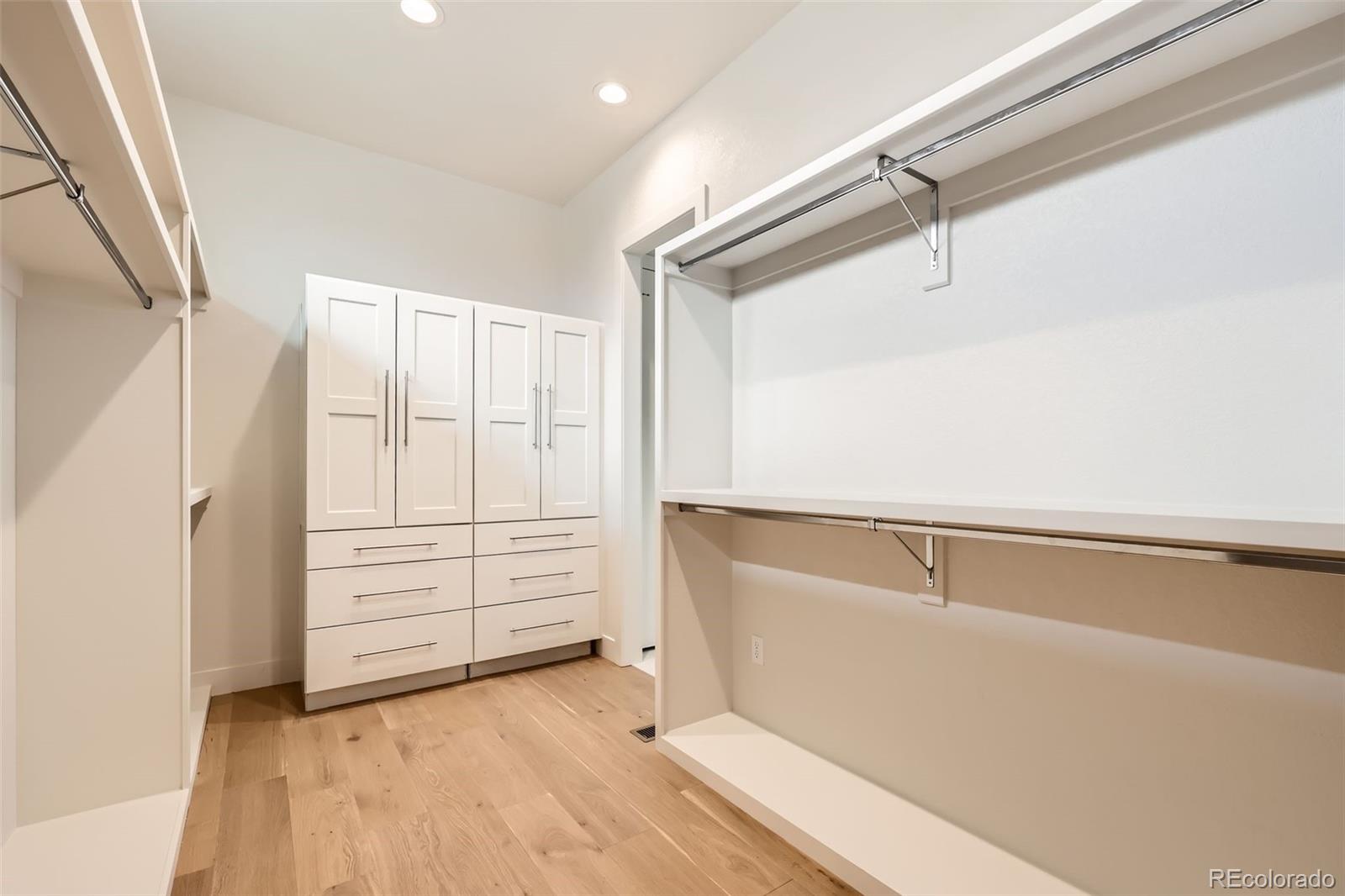 5841 Powell Road Parker, CO 80134 - Photo 24 of 50 a view of walk in closet with empty racks