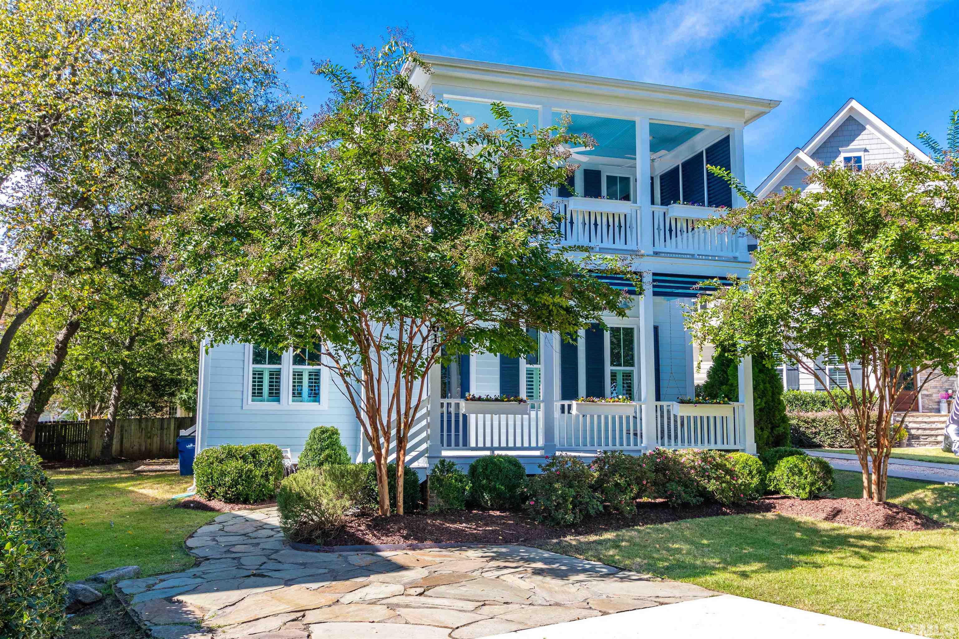 610 New Road Raleigh, NC 27608 - Photo 1 of 24 a front view of a house with garden