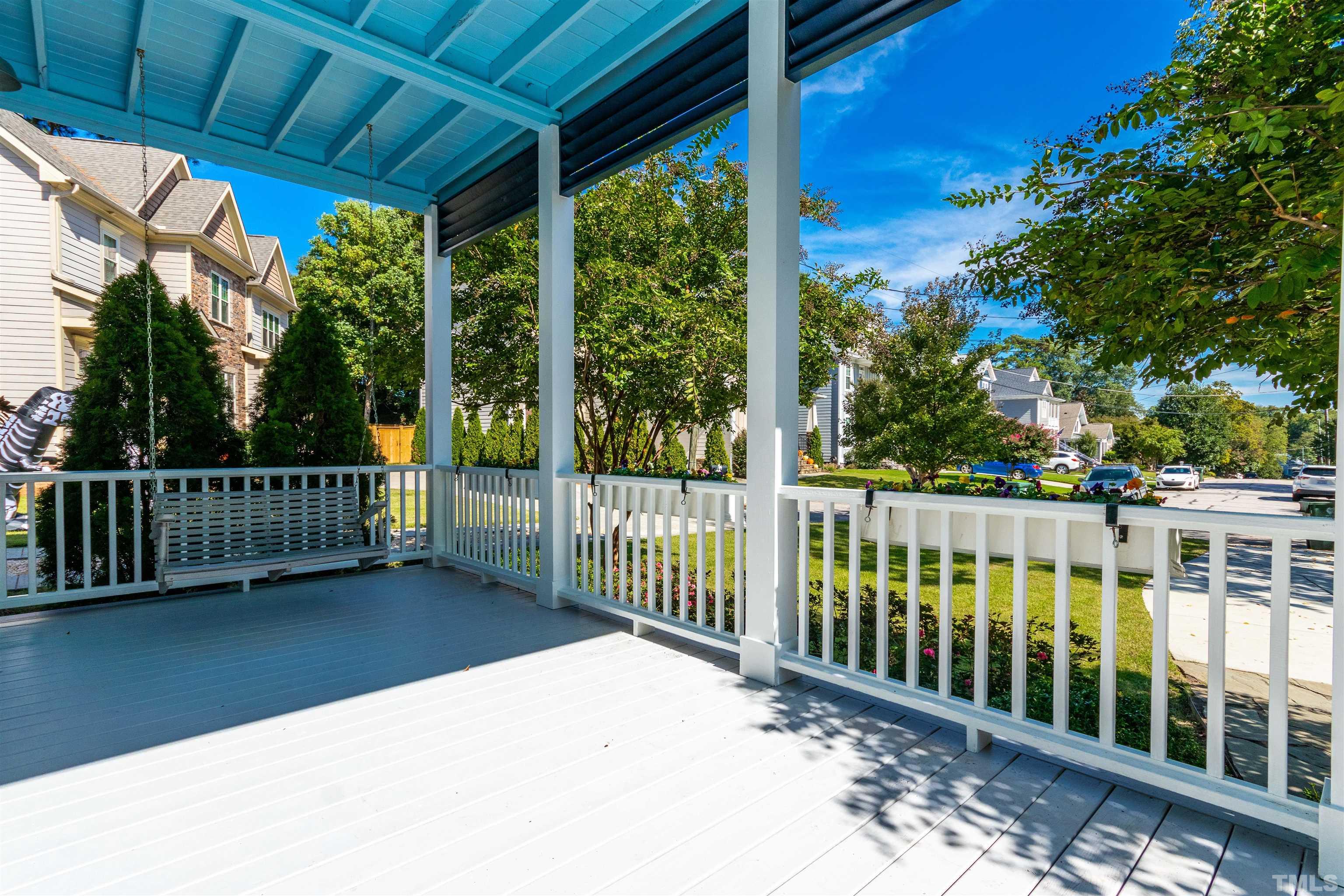 610 New Road Raleigh, NC 27608 - Photo 3 of 24 a view of a balcony with wooden floor